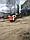 Разгрузка земли мини-погрузчиком Bobcat T-140, фото 6
