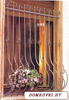 Решетка кованая на окно под цветочницу модель13