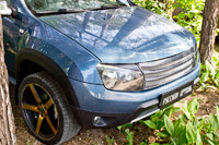 Накладки на передние фары (реснички) Renault Duster 2010-2014 (I поколение) - фото 5 - id-p87818792