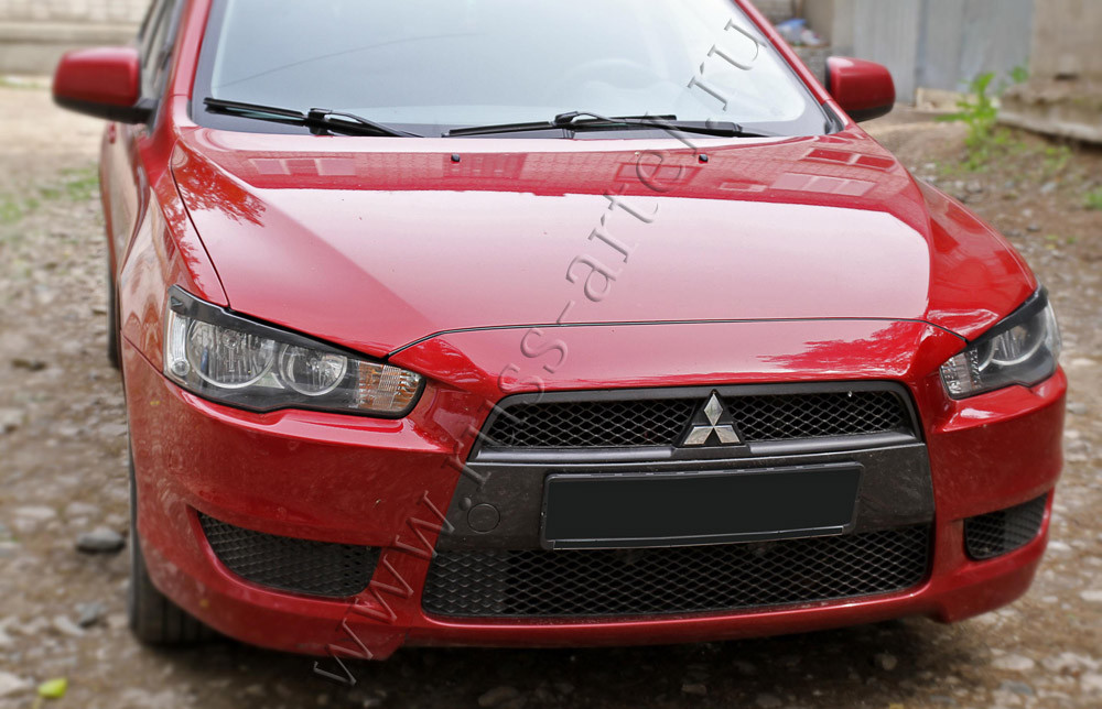 Накладки на передние фары (реснички) Mitsubishi Lancer X 2007-2010