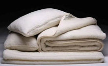 Одеяла и одеяла-покрывала из овечьей шерсти