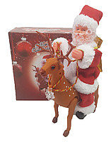 Санта-клаус (Дед мороз) едет на олене, музыкальный 20*30 см