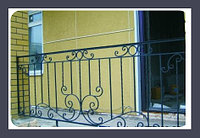 Ограждение на балкон с коваными завитками модель 126