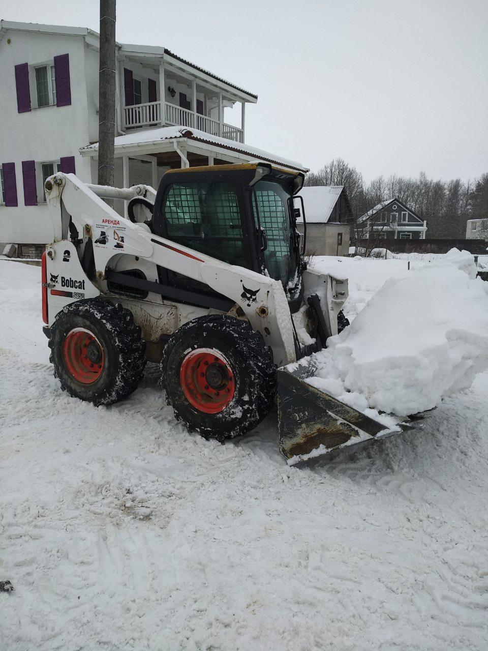 Выравнивание дороги(очистка от снега) мини-погрузчиком Bobcat S-850