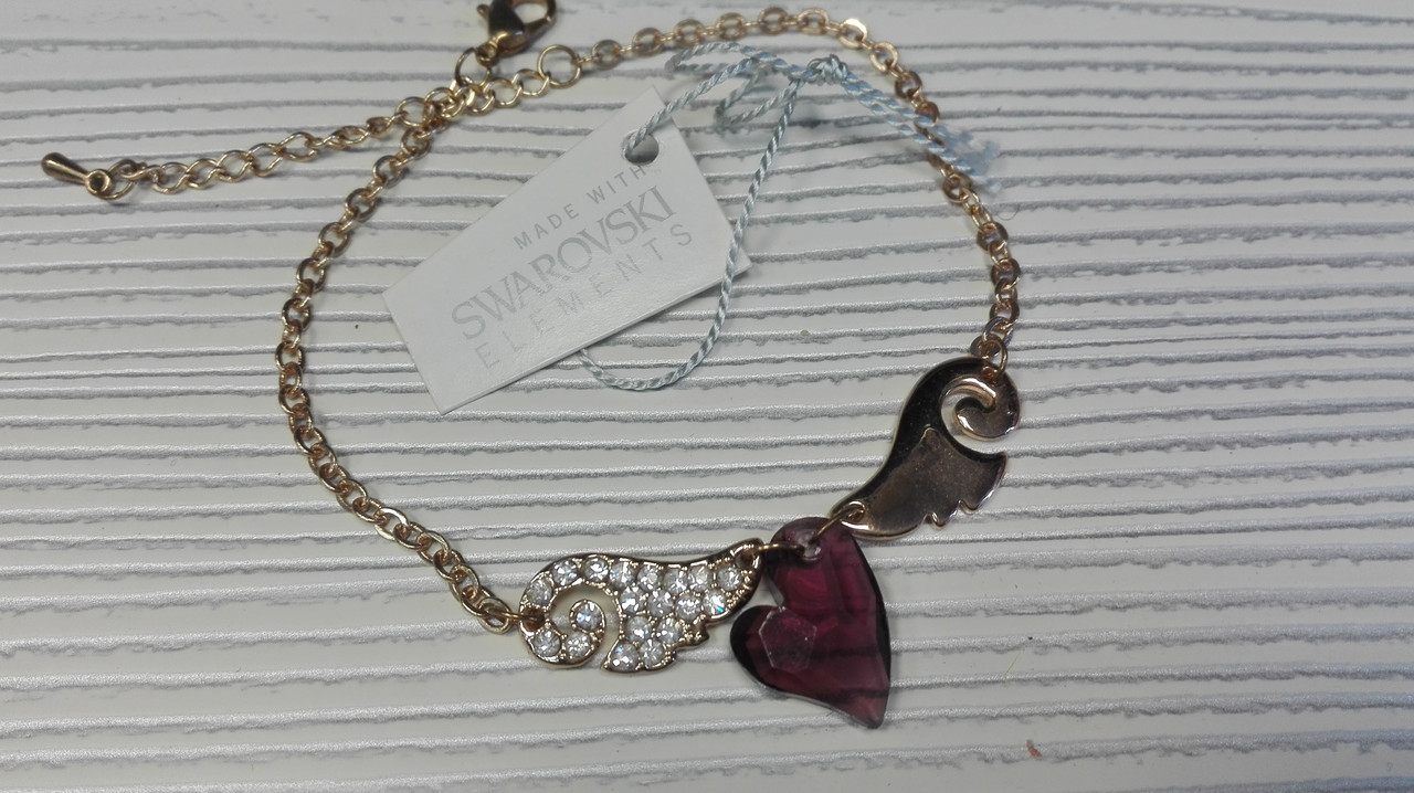 Стильный позолоченный браслет с сердечком ,с кристаллами Swarovski