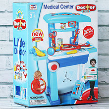 Детский игровой набор доктора арт. 008-925A в чемоданчике (превращается в стол)