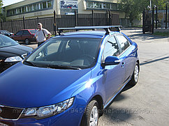 Багажник LUX для Kia Cerato II, седан, 2009-2013гг. (аэродинамическая дуга)