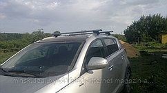 Багажник Атлант для Kia Sportage 3 2010-2016 (на интегрированные рейлинги)  (аэродинамическая дуга)