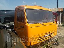 Кабина KAMAZ оранжевая (крепления зеркал, рулевая стойка, сидения, обивка дверей, радиаторы)