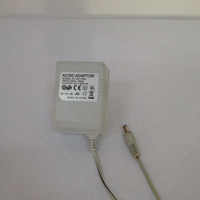 Адаптер питания AC/DC ADAPTOR XY-G411250 INPUT 230V 50Hz OUTPUT 12V 500mA