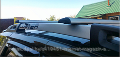 Багажник Атлант для Renault Duster 2015-... (на широкие рейлинги) (крыловидная дуга)