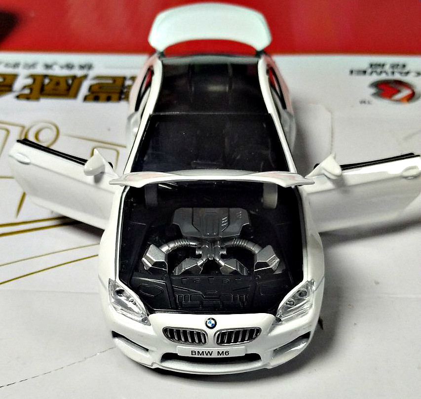 Металлическая белая машинка BMW М6 Свет звук 16 см - фото 2 - id-p116817022