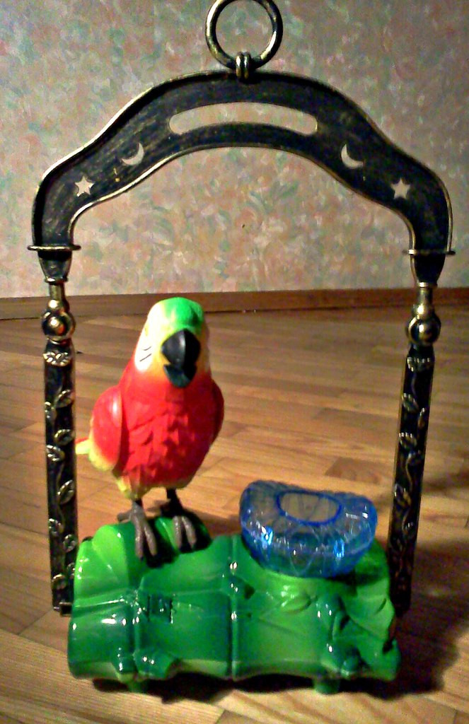 Игрушечный поющий попугай с подсветкой - фото 1 - id-p7338145