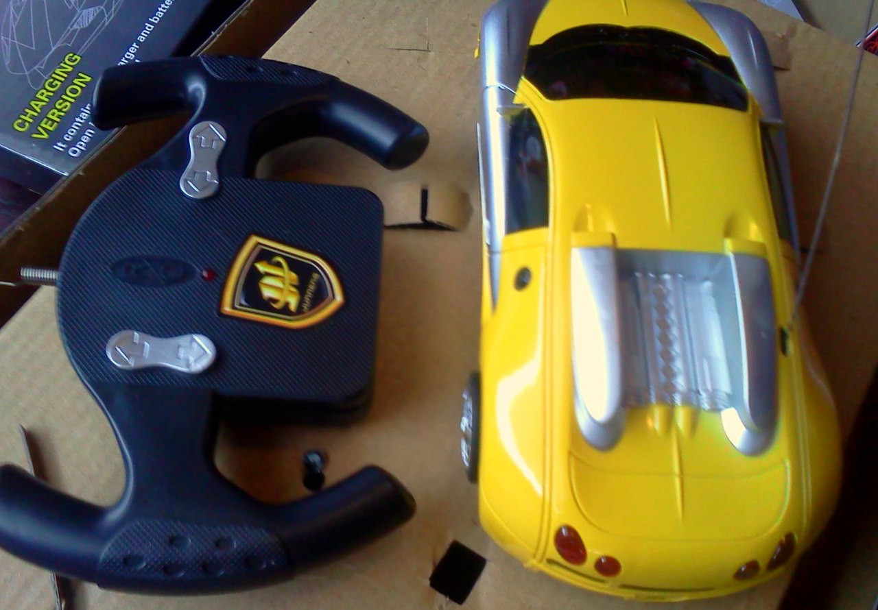 Машинка гоночная желтая на радиоуправлении на аккумкляторах - фото 3 - id-p7399240