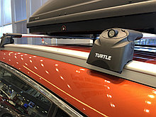 Багажник Turtle Air 2 черные для Geely Atlas с 2017г.-  (интегрированные рейлинги) аэро дуга