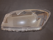 Стекло фары Toyota RAV4 3 A30 2008-2010 рестайлинг левое