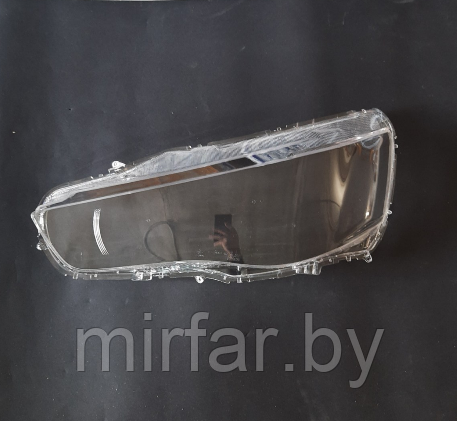 Стекло фары Mitsubishi Outlander XL 2010-2012 рестайлинг левое