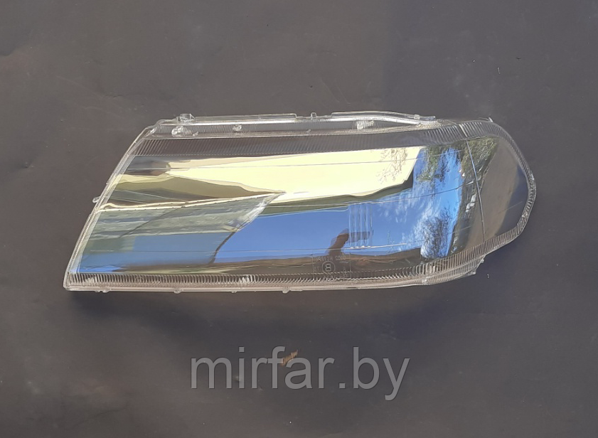 Стекло фары Mitsubishi Pajero Sport 1 1996-2008 левое