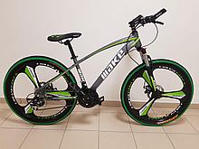 Зеленый велосипед на литых дисках