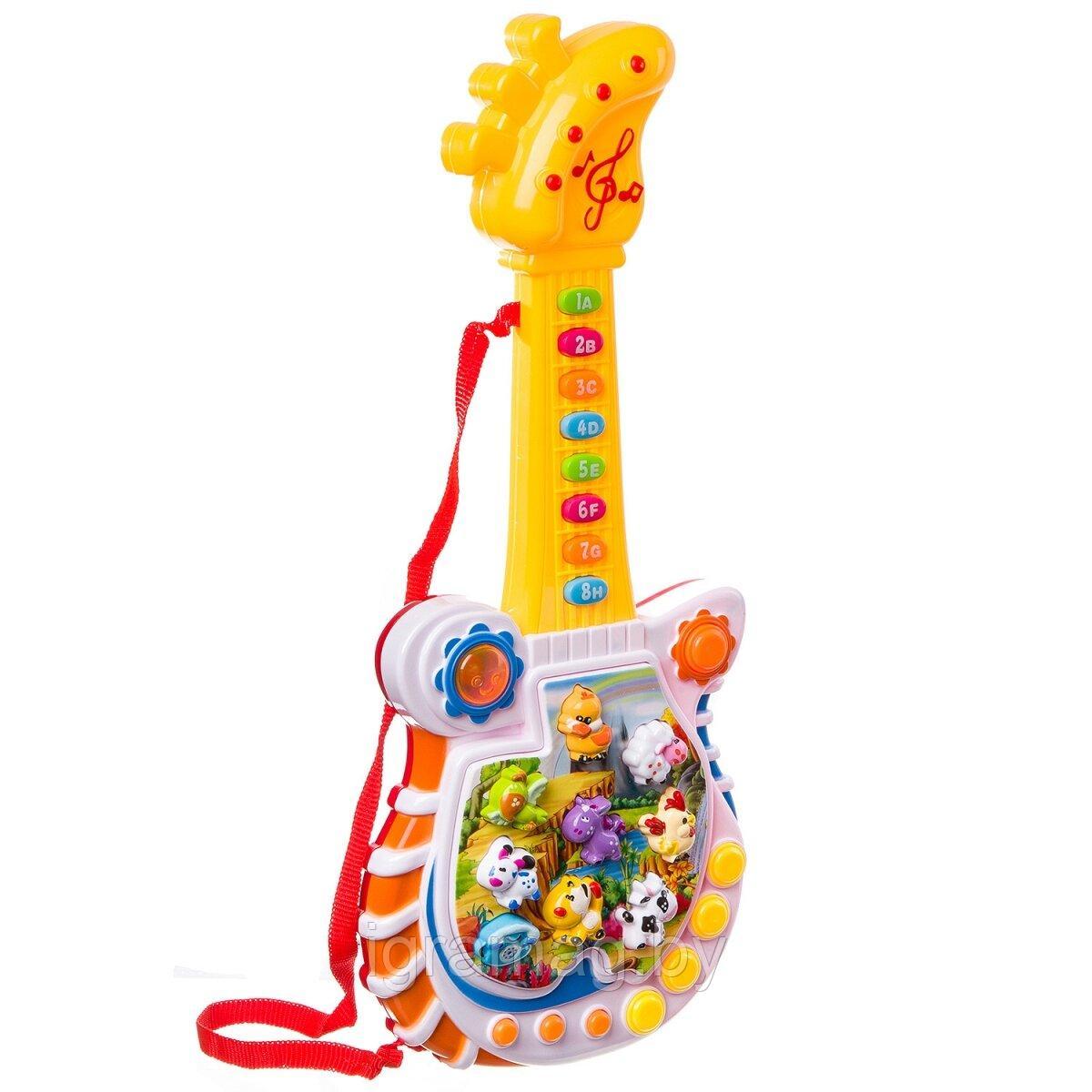 Развивающий игрушечная гитара (свет, звук) 43 см (англ) - фото 2 - id-p138145776
