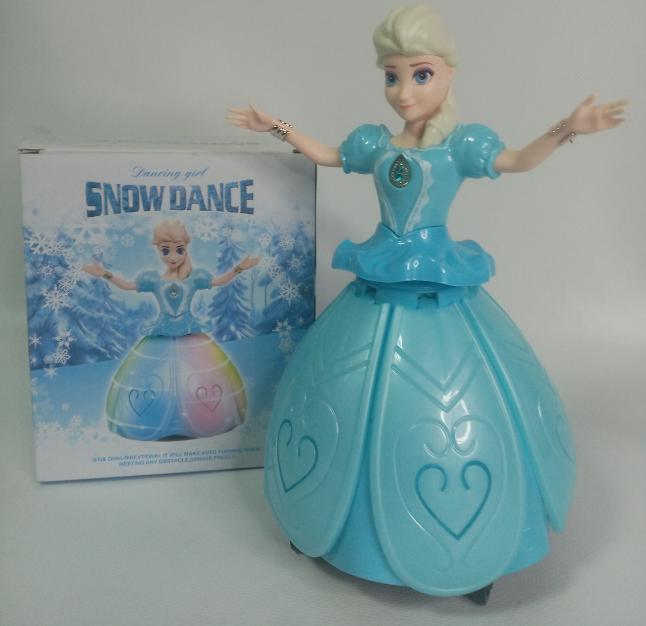 Кукла Эльза Frozen музыкальная, ездит, крутится.