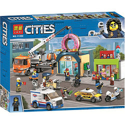 Конструктор Lari Cities 11392 Открытие магазина по продаже пончиков (аналог Lego City 60233) 848 деталей