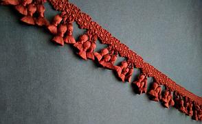 Бахрома декоративная цвета терракоты.