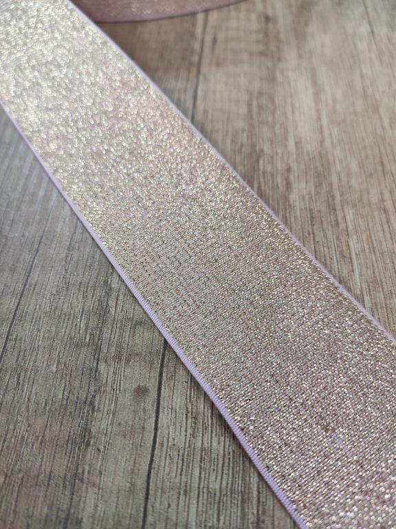 Лента эластичная , блестящая . Розовая с золотым блеском . Ширина 45 мм
