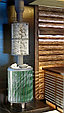 Чугунная банная печь ProMetall Атмосфера в ламелях из натурального камня "Змеевик" наборный, фото 5