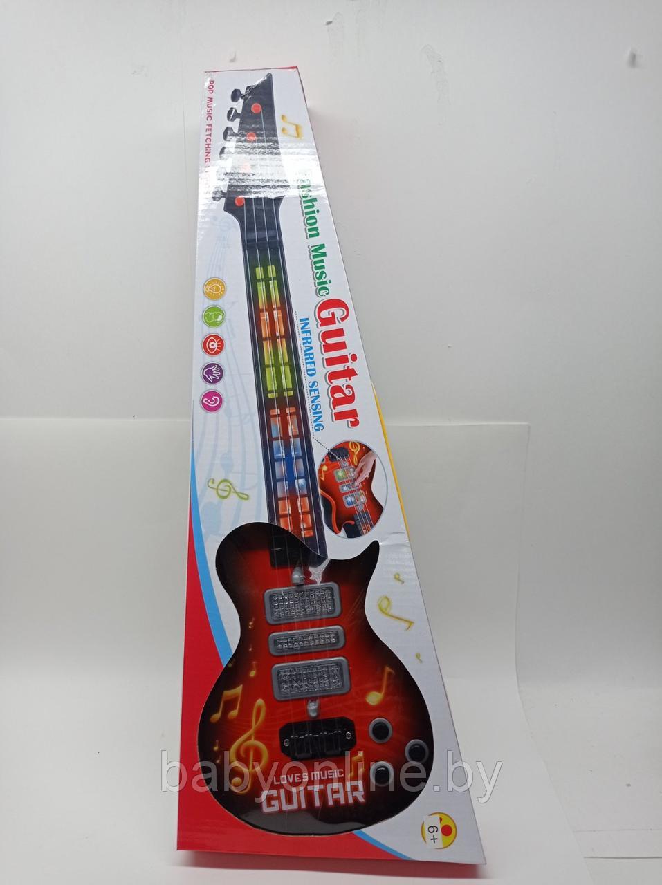 Игрушка детское Электро Гитара 4 струны арт 939A - фото 1 - id-p166944301