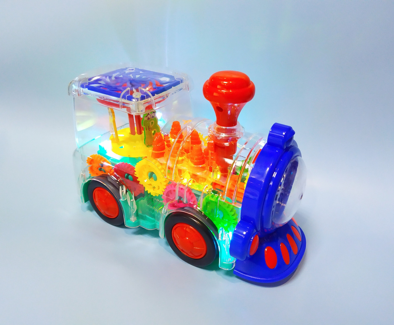 Светящийся музыкальный паровозик Gear Train с шестеренками 20 см, арт. FS238-1A, фото 1