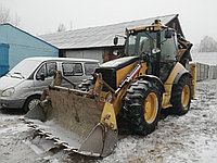 Очистка дороги от снеговой корки экскаватором-погрузчиком