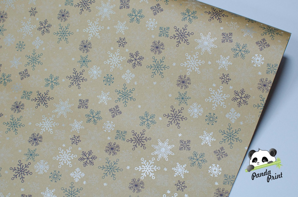 Упаковочная бумага Снежинки цветные (580 мм)