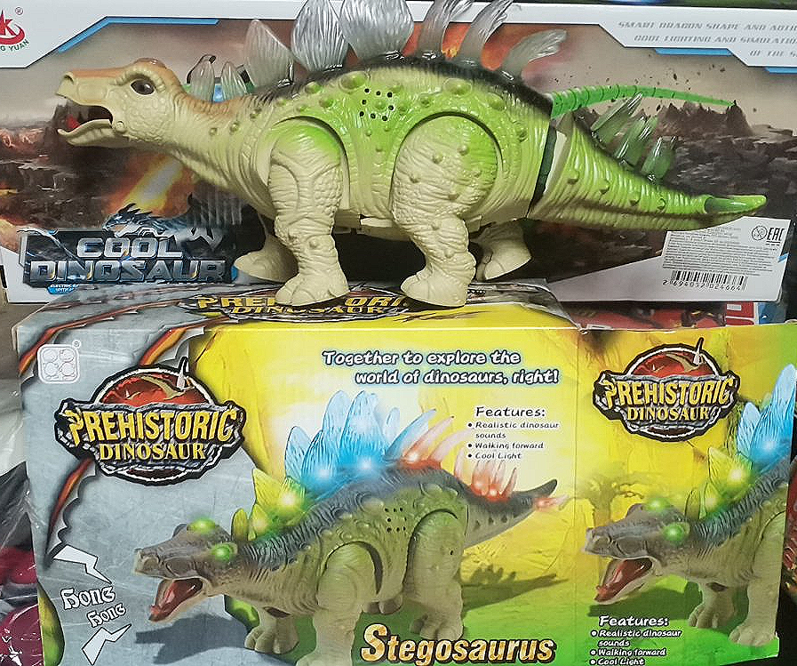 Игрушка музыкальный ходячий динозавр Stegosaurus Стегозавр 35 см свет, звук - фото 1 - id-p169975253
