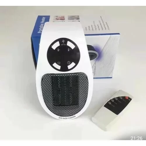 Портативный мини-обогреватель электрический Portable Heater - фото 7 - id-p172173591