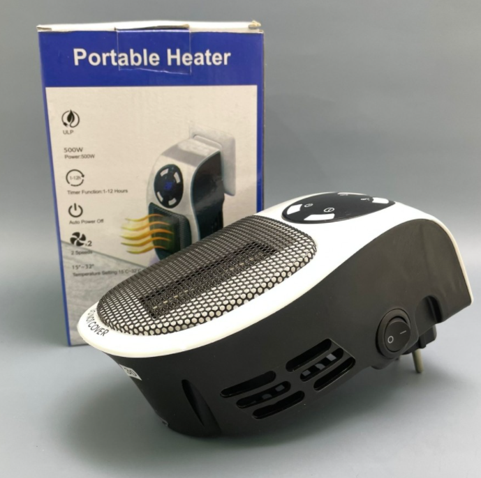 Портативный электрический мини обогреватель с пультом ДУ Portable Heater 500 W (2 режима работы, таймер) - фото 6 - id-p164821908