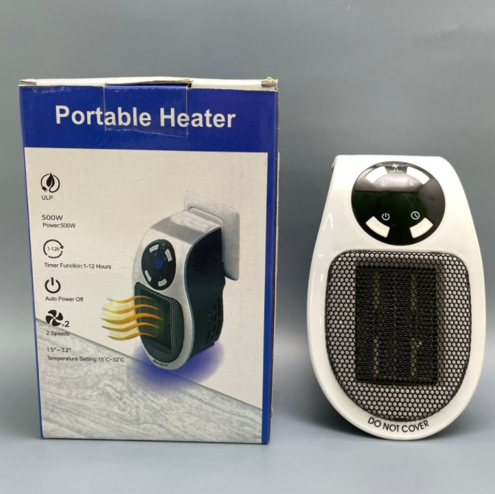 Портативный электрический мини обогреватель с пультом ДУ Portable Heater 500 W (2 режима работы, таймер) - фото 7 - id-p164821908