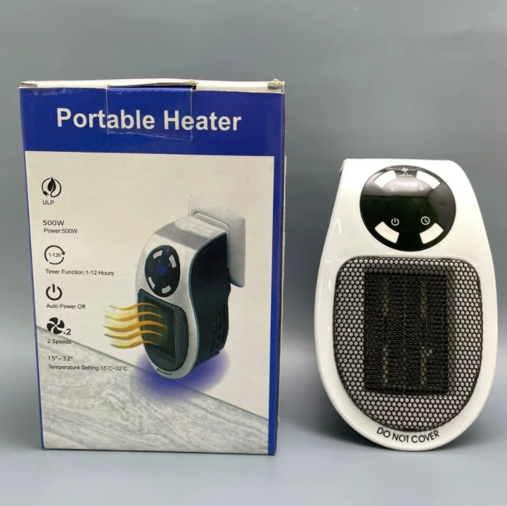 Портативный электрический мини обогреватель с пультом ДУ Portable Heater 500 W (2 режима работы, таймер) - фото 7 - id-p180108000