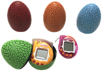 Игрушка тамагочи в яйце.Электронная игрушка тамагочи. Игрушки 90-ых, фото 1