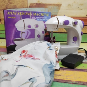 Швейная машинка компактная Mini Sewing Machine (Портняжка) с инструкцией на русском языке с подсветкой - фото 1 - id-p132030758