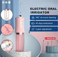 Ирригатор (флоссер) для гигиены полости рта Oral Irrigator 4 сменные насадки Розовый