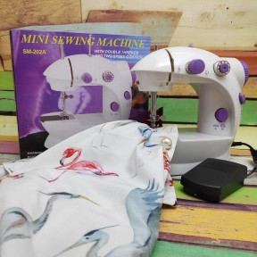 Швейная машинка компактная Mini Sewing Machine (Портняжка) с инструкцией на русском языке без подсветки - фото 1 - id-p138889598
