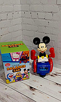 Музыкальная игрушка Микки Маус на гироскутере со световыми эффектами в коробке