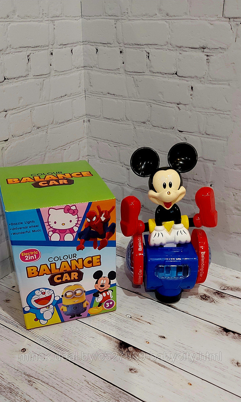 Музыкальная игрушка Микки Маус на гироскутере со световыми эффектами в коробке - фото 1 - id-p197520493
