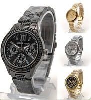 Элегантные женские часы на металлическом браслете MICHAEL KORC