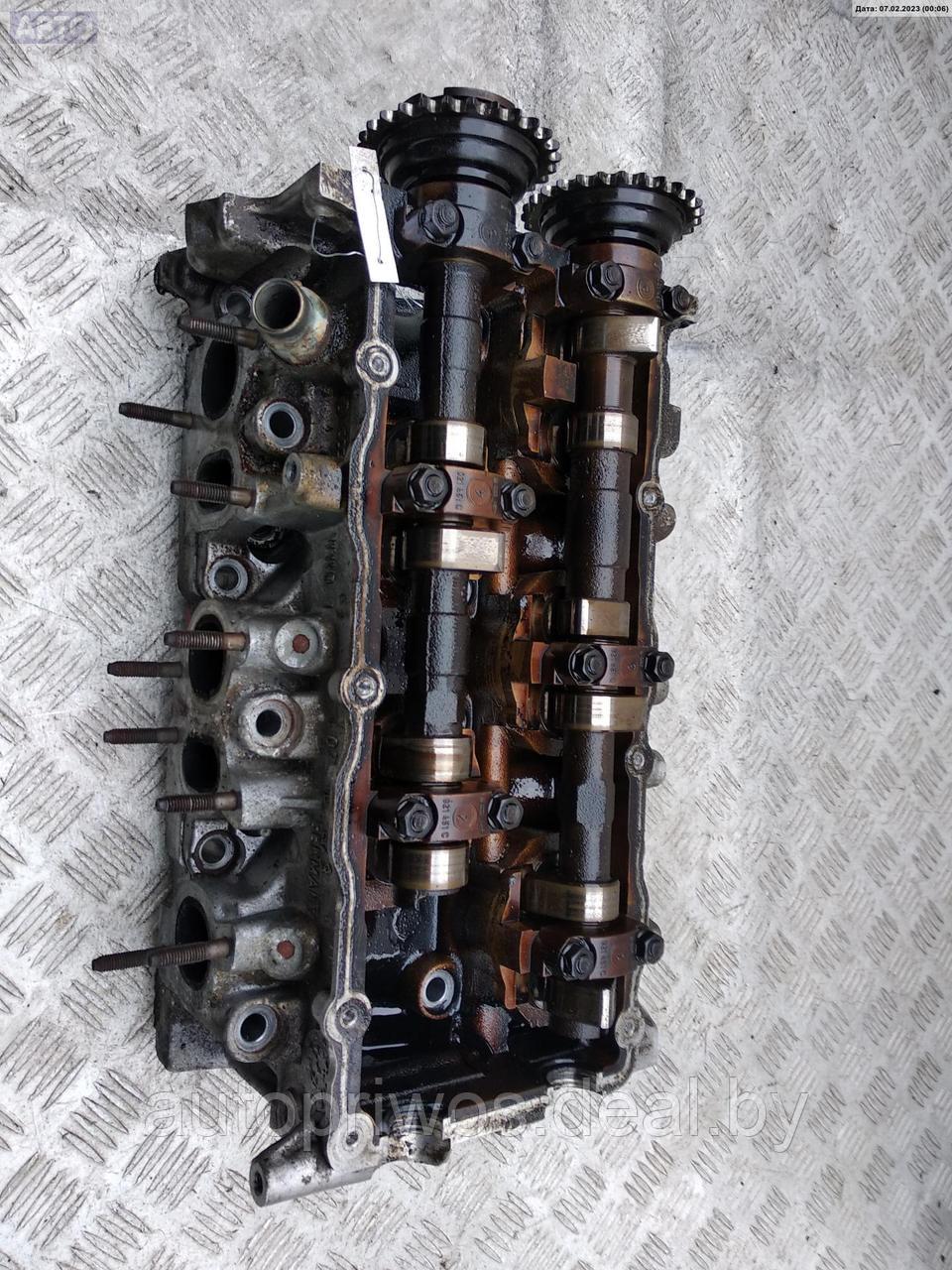 Головка блока цилиндров двигателя (ГБЦ) Volkswagen Bora - фото 1 - id-p199817754