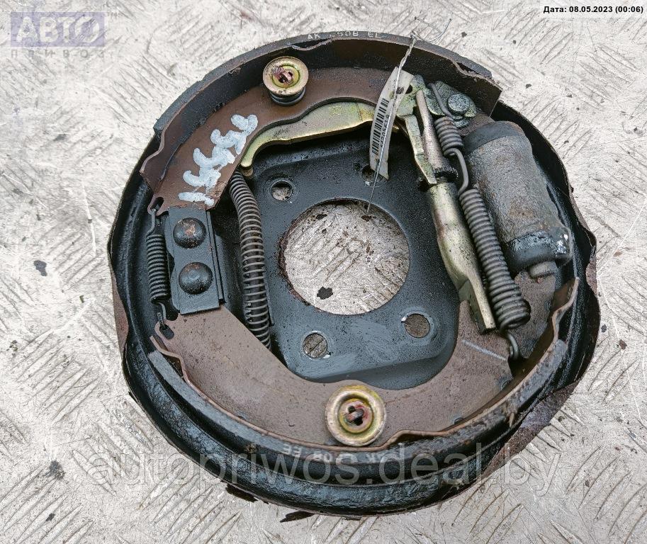 Щиток (диск) опорный тормозной задний правый Mitsubishi Lancer (1992-1996) - фото 2 - id-p206482537