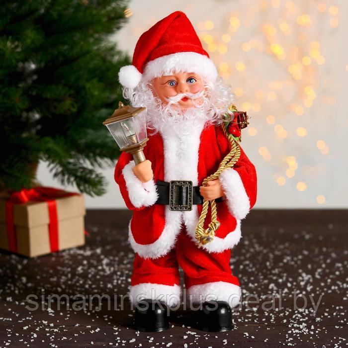 Дед Мороз "Красная шубка, ремешок, с фонариком" с подсветкой, двигается, 27 см