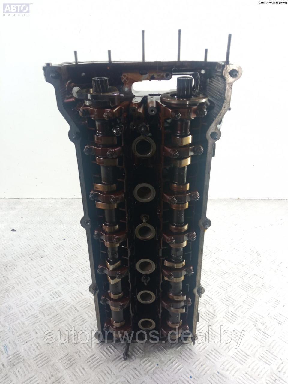 Головка блока цилиндров двигателя (ГБЦ) BMW 5 E39 (1995-2003) - фото 1 - id-p169057098