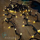 Светодиодная гирлянда Rich LED 10 м, 100 LED, 24 В, соединяемая, тепло белая, черный резиновый провод,